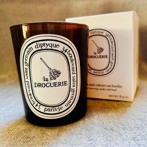 Diptyque empty La Droguerie luxury French candle vessel.